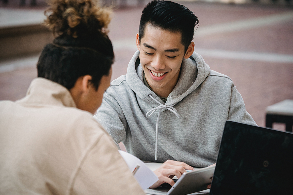 Two students work together to study