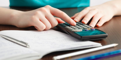 student using a calculator